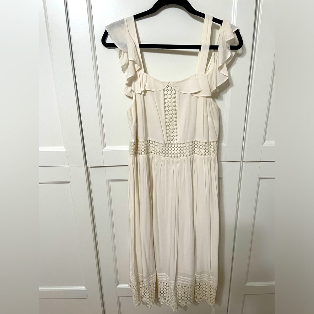 Cream colored Loft dress with lace detailing and straps plus off the shoulder